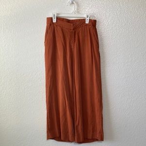 Burgundy orange flowy  cropped pants women’s size XS